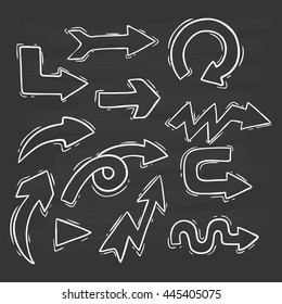 Doodle arrows set on chalkboard background