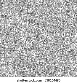 Doodle background in vector with doodles, flowers and paisley. Vector ethnic pattern can be used for wallpaper, pattern fills, coloring books and pages for kids and adults. Black and white.