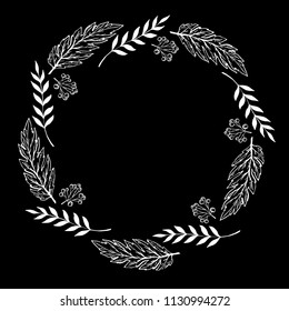 Doodle berry and leaf circle frame on a black background. Wreath of leaves. Ready template for design, postcards, printing