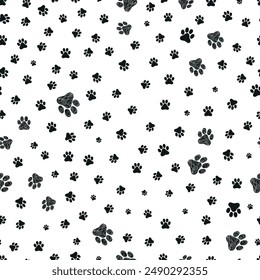 Doodle black paw prints. Seamless fabric design