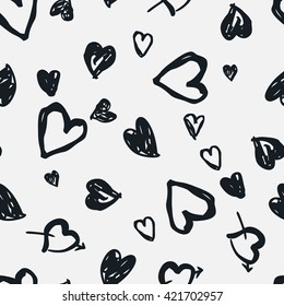 Doodle black and white seamless pattern with hearts. Valentine's day background.