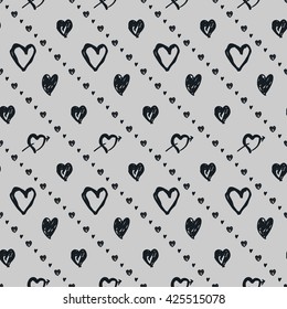 Doodle black and white seamless pattern with hearts. Valentine's day background.