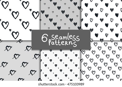 Doodle black and white seamless pattern set with hearts. Hand-drawn monochrome vector backgrounds. Valentines day ornaments.