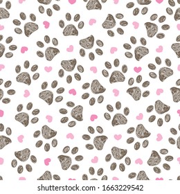 Doodle brown paw prints with pink hearts seamless vector pattern for fabric design