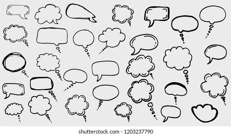 Doodle chat cartoon bubbles. Hand drawn vector set. Isolated on white background