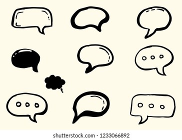 Doodle chat cartoon bubbles. Hand drawn vector set. Isolated on white background