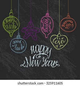 The doodle Christmas tree decorations drawn by hand 
 with the written wishes and "Happy new year" lettering.Background blackboard.Vector illustration.