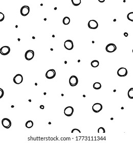 Doodle circles seamless pattern. Black dots texture background.