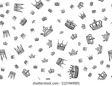 Doodle crown seamless pattern. Scattered hand drawn crowns on white background. Vector illustration for print, textile, paper.