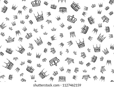 Doodle crown seamless pattern. Scattered hand drawn crowns on white background. Vector illustration for print, textile, paper.