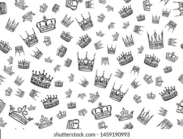 Doodle crowns seamless pattern. Scattered hand drawn crown background. Vector illustration for print, textile, paper.