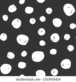 Doodle dots seamless pattern. Hand drawn circles texture in black and white.