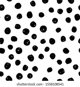 Doodle dots seamless pattern. Hand drawn circles texture in black and white.