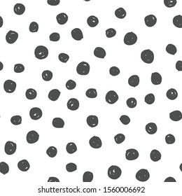 Doodle dots seamless pattern. Hand drawn circles texture in black and white.