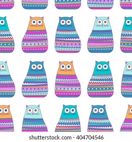 Doodle ethnic cats. Vector seamless pattern with cute striped kittens. Hand drawn background for children. Blue, pink, white, green and orange colors.
