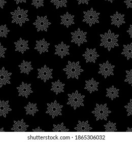 Doodle gray mandala in the shape of snowflakes on black background. Suitable for wrapping paper, wallpaper, textile.