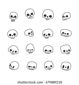 Doodle hand drawn cute naive skulls vector set. Black and white.