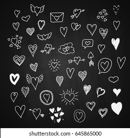 Doodle hand drawn hearts collection on blackboard background. Vector EPS10.