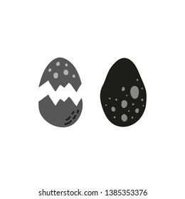 Doodle hatched and whole dinosaur egg isolated on white background.