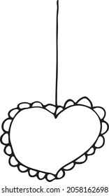 Doodle Heart pendant. A heart-shaped pendant with scribbles. Cute hand-drawn image of a heart isolated on a white background. A pendant with a black outline for Valentine's Day, February 14, a wedding