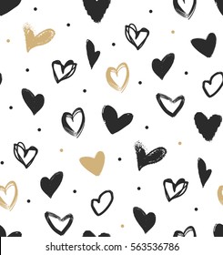 Doodle hearts in black and gold seamless pattern. Hipster simple pattern for wrapping paper or background. 