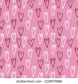 Doodle hearts seamless vector pattern. Valentine's Day background. Marker drawn different heart shapes. Hand drawn ornament. Pastel colors, soft pink and white.