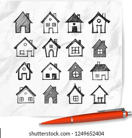 Doodle houses on realistic white paper background.