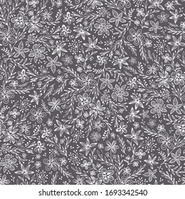Doodle lacy floral vector seamless pattern. Hand drawn white contours of abstract flowers and leaves on gray background. Template for design, textile, wallpaper, clothing, ceramics.