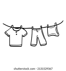 Doodle Laundry on a rope icons. Vector laundry clothes sketch