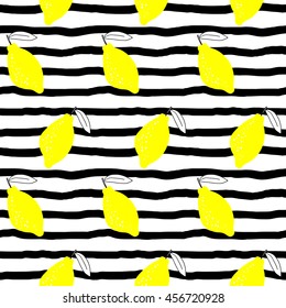 Doodle lemons on stripy background. Seamless pattern.