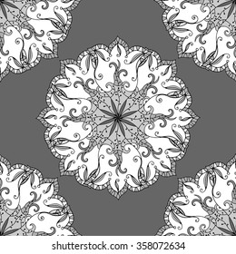 Doodle mandala. Vector seamless pattern with hand drawn doodle mandala. Indian tribal ornament. Black and white colors.