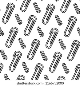 doodle metal clips tool to paper background