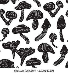 Doodle mushrooms related seamless pattern. Rounded edges musrooms icons of black color. Chaotic layout. Vector stock illustration in hand-drawn simple style. 