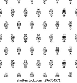 Doodle owls in aztec style. Seamless pattern.