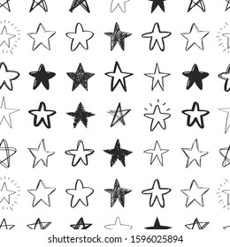 Doodle pattern of rough stars. Hand drawn vector illustration of black grunge elements on white background. Sketch of markers and highlights for design use, postcards, web, wallpapers, wrapping paper 