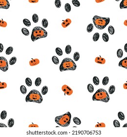 Doodle paw prints with funny pumpkin. Happy Halloween card. Fabric design seamless pattern