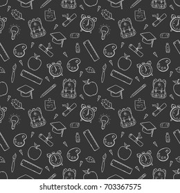 doodle school supplies in seamless pattern on black background