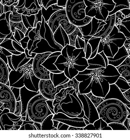 Doodle seamless background in vector with doodles, flowers and paisley. Vector ethnic pattern can be used for wallpaper, pattern fills. Black and white.