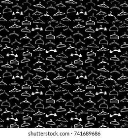 Doodle seamless clothes hangers pattern. Hand drawn cute sketchy style scribble. Graphic design element for scrapbook, fashion clothes shop web site, print, sale flyer, invitation. Vector illustration