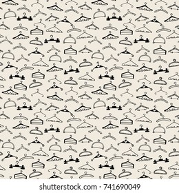 Doodle seamless clothes hangers pattern. Hand drawn cute sketchy style scribble. Graphic design element for scrapbook, fashion clothes shop web site, print, sale flyer, invitation. Vector illustration