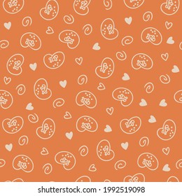 Doodle seamless pattern of pretzels and hearts. Perfect for scrapbooking, textile and prints. Hand drawn vector illustration for decor and design.

