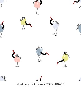 Doodle seamless pattern with red crowned cranes. Perfect for T-shirt, textile and print. Hand drawn vector illustration for decor and design.
