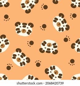 Doodle seamless pattern with tiger faces and paws. Perfect for T-shirt, textile and print. Hand drawn vector illustration for decor and design.
