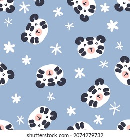 Doodle seamless pattern with tiger faces and snowflakes. Perfect for T-shirt, textile and print. Cartoon style vector illustration for decor and design.
