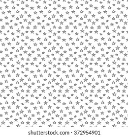 Doodle sketch star seamless pattern. Little cute hand drawn black stars on white. Festive black and white seamless background, wrapping paper, texture, wallpaper, textile, fabric. Vector illustration.