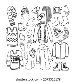 Doodle sketch of winter clothes. Hand drawn sweater, scarfs, mittens, hats, gloves etc. Black and white vector objects on isolated background.