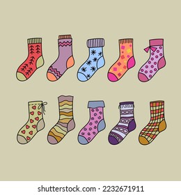 Doodle socks with different texture and color. Winter clothing items. For postcard, sticker, packaging.