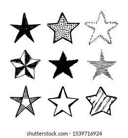 Doodle stars. Set of nine black hand drawn stars isolated on white background. Vector illustration