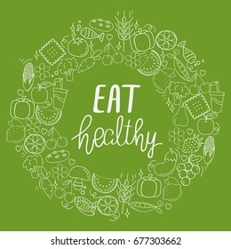 Doodle style of flat food and drink arranged of a round frame on green background. Handwritten inscription Eat healthy. Concept of healthy food. Calligraphy for the print typography.