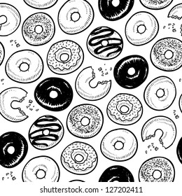 Doodle style frosted donuts seamless vector background ready to be tiled.